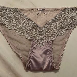 V1969 tan to light lilac in color. NWOT